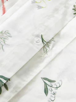 Omkeerbare katoenen perkale kussenhoes Twigs met winterse prints