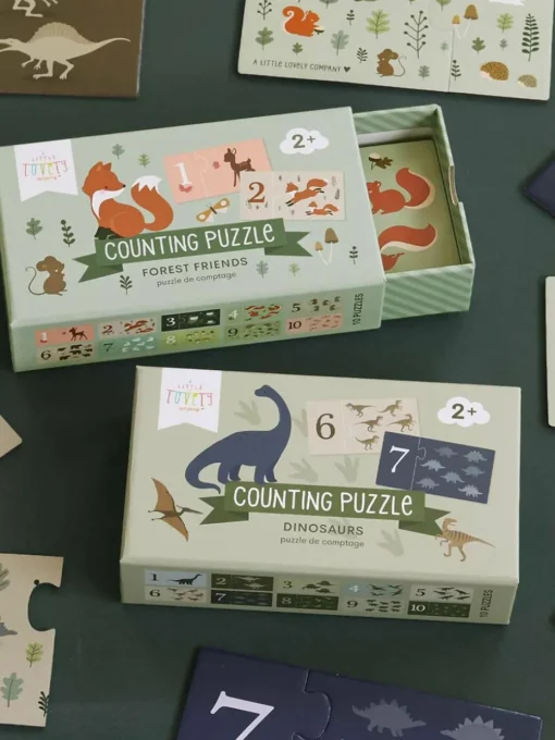 Puzzels Dinosaurs om cijfers te leren