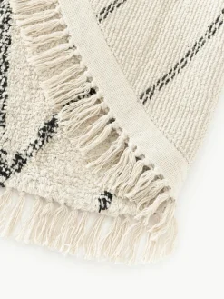 Rond katoenen vloerkleed Bina met ruitjesmotief, handgetuft