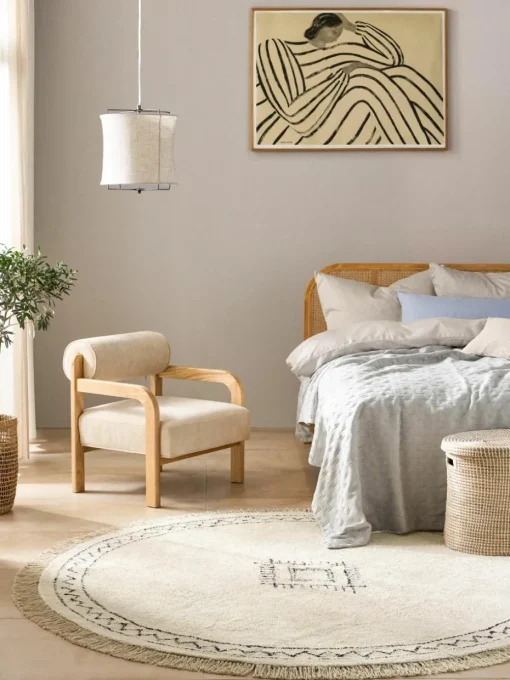 Rond katoenen vloerkleed Fionn met franjes, handgetuft