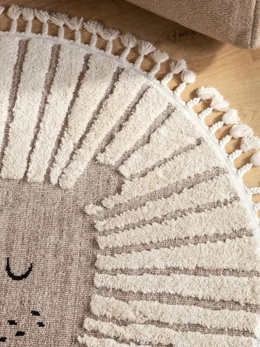 Rond kindervloerkleed Momo met kwastjes en hoog-laag effect