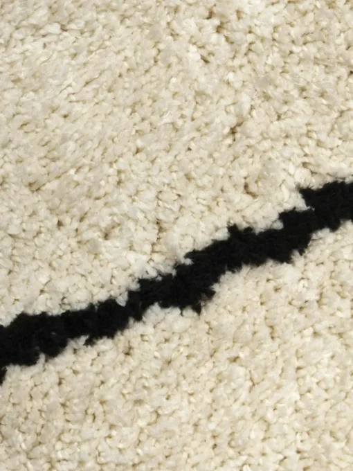 Rond pluizig hoogpolig vloerkleed Naima, handgetuft