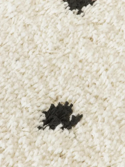 Rond pluizig hoogpolig vloerkleed Ayana, met stippels
