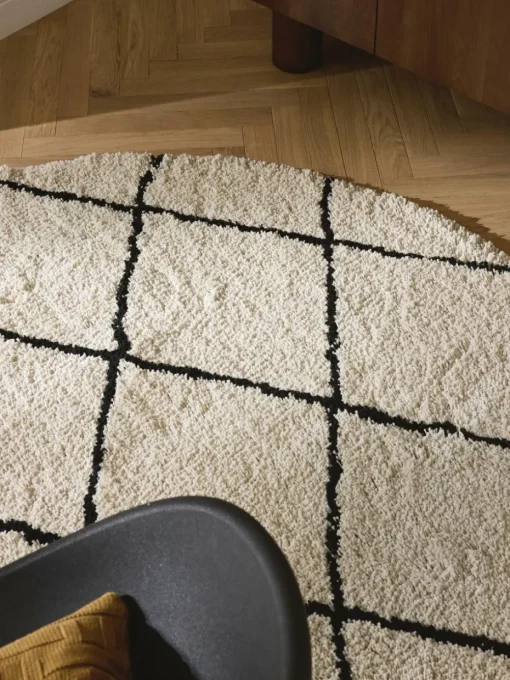 Rond pluizig hoogpolig vloerkleed Naima, handgetuft
