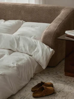Slaapbank Eliot (2-zits) uit teddy-bouclé