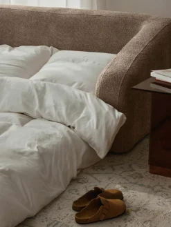 Slaapbank Eliot (2-zits) uit teddy-bouclé