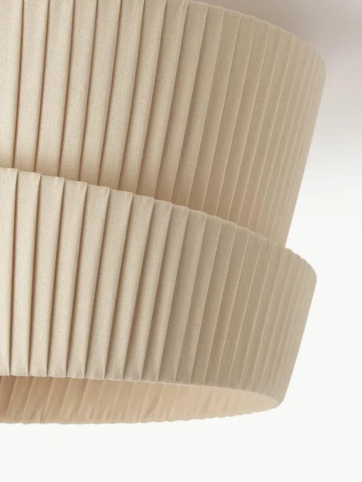 Wandlamp Nyla met asymmetrische lampenkap