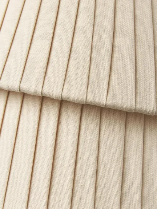 Wandlamp Nyla met asymmetrische lampenkap