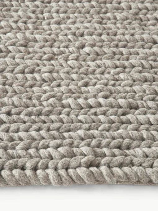 Wollen vloerkleed Bruna met gevlochten structuur