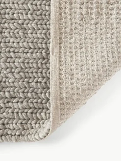 Wollen vloerkleed Bruna met gevlochten structuur