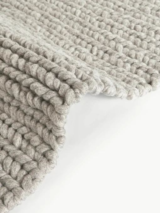 Wollen vloerkleed Bruna met gevlochten structuur